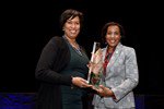 D.C. Mayor Muriel Bowser accepts the 2019 Scull Award from COG Vice President and Loudoun County Chair Phyllis Randall