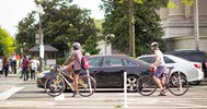 Cyclists_and_cars_on_Pennsylvania_Avenue_Aimee_Custis_Flickr-600