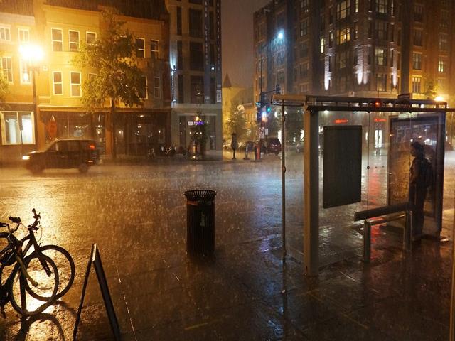 Extreme rain at bus stop 14th and U Streets Washington DC