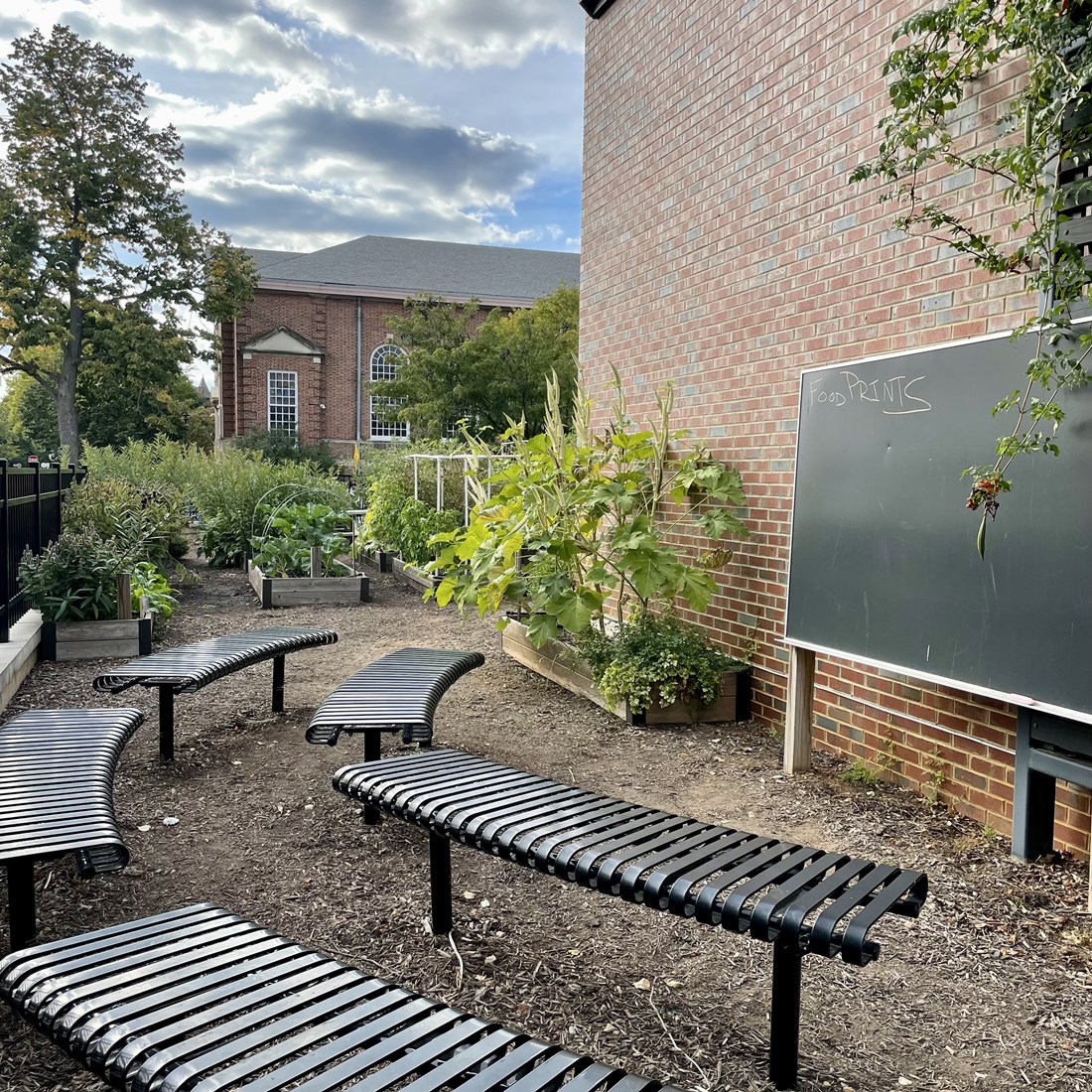 Caption_FoodPrints_vegetable_garden_and_classroom